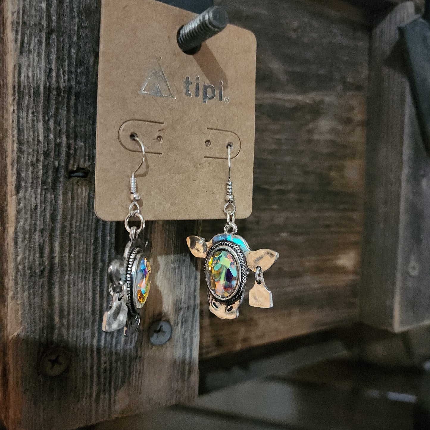 Dusty Trails Cow Silvertone Earrings