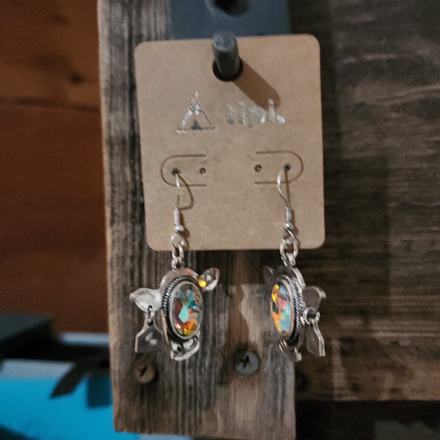 Dusty Trails Cow Silvertone Earrings