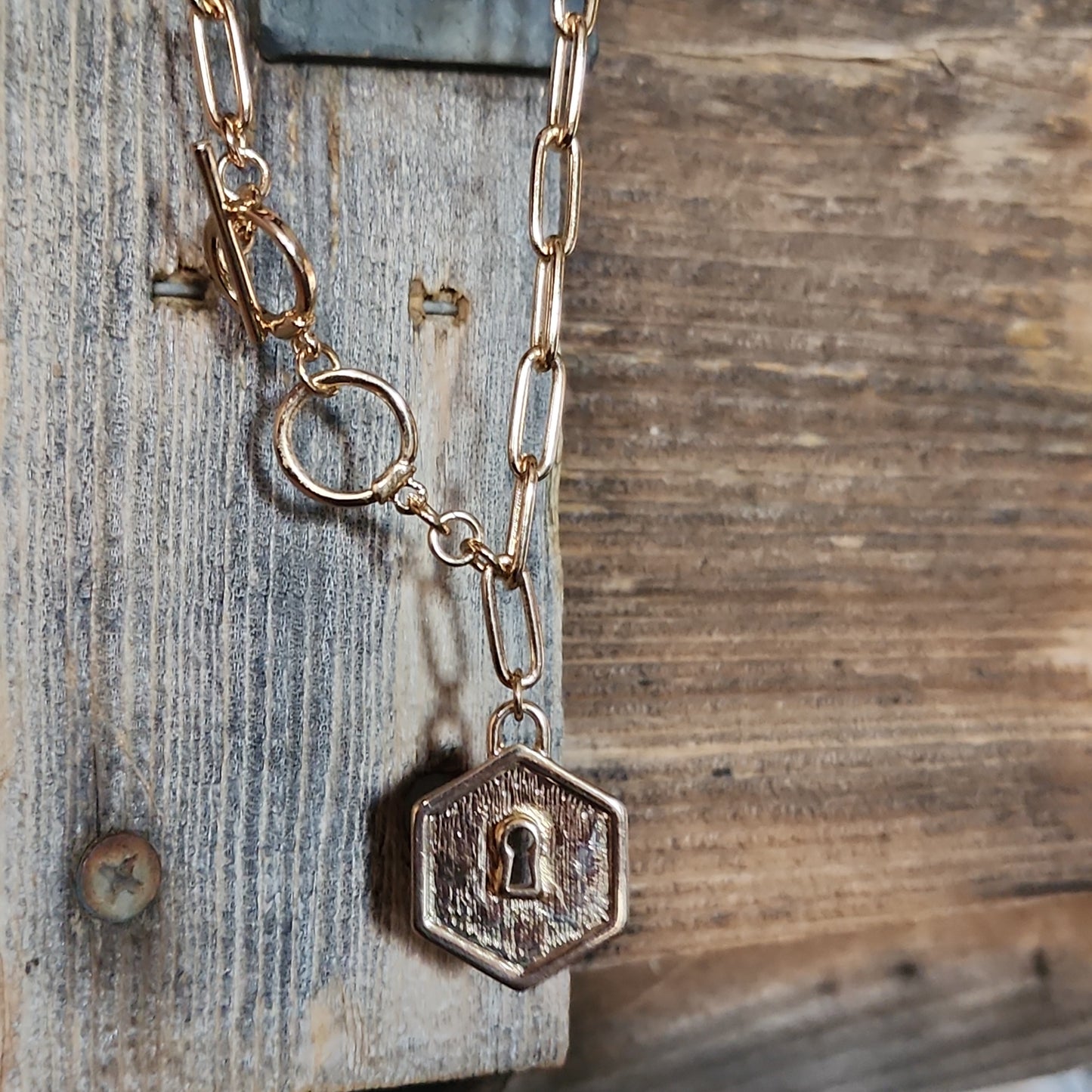 Goldtone Hexagon Lock Toggle Bracelet