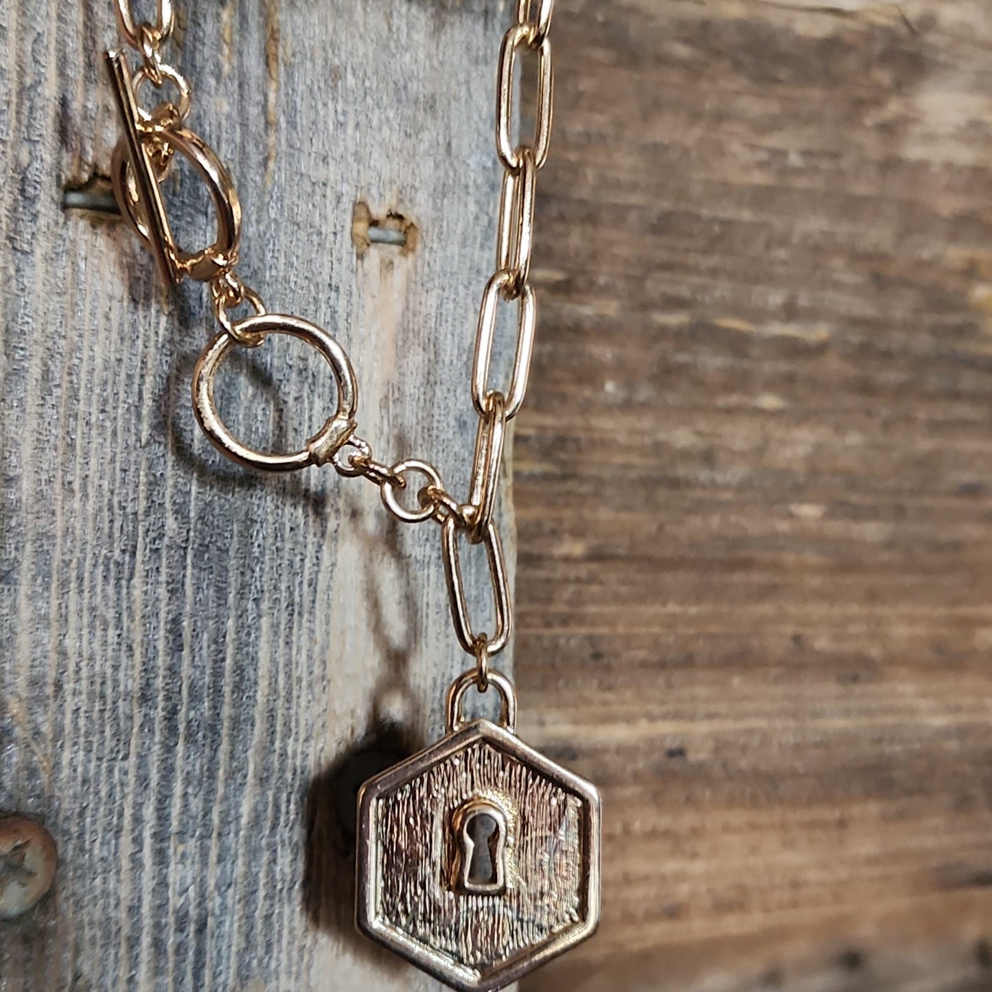 Goldtone Hexagon Lock Toggle Bracelet